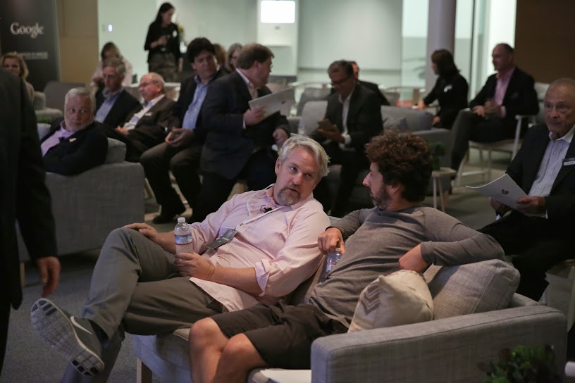 Sergey Brin, CEO of Google, and Andy Conrad, Google, chat during the Listening Tour event at Google's headquarters